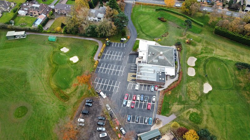 Aerial view of Sand Moor Golf Club car park and surrounding course in Leeds