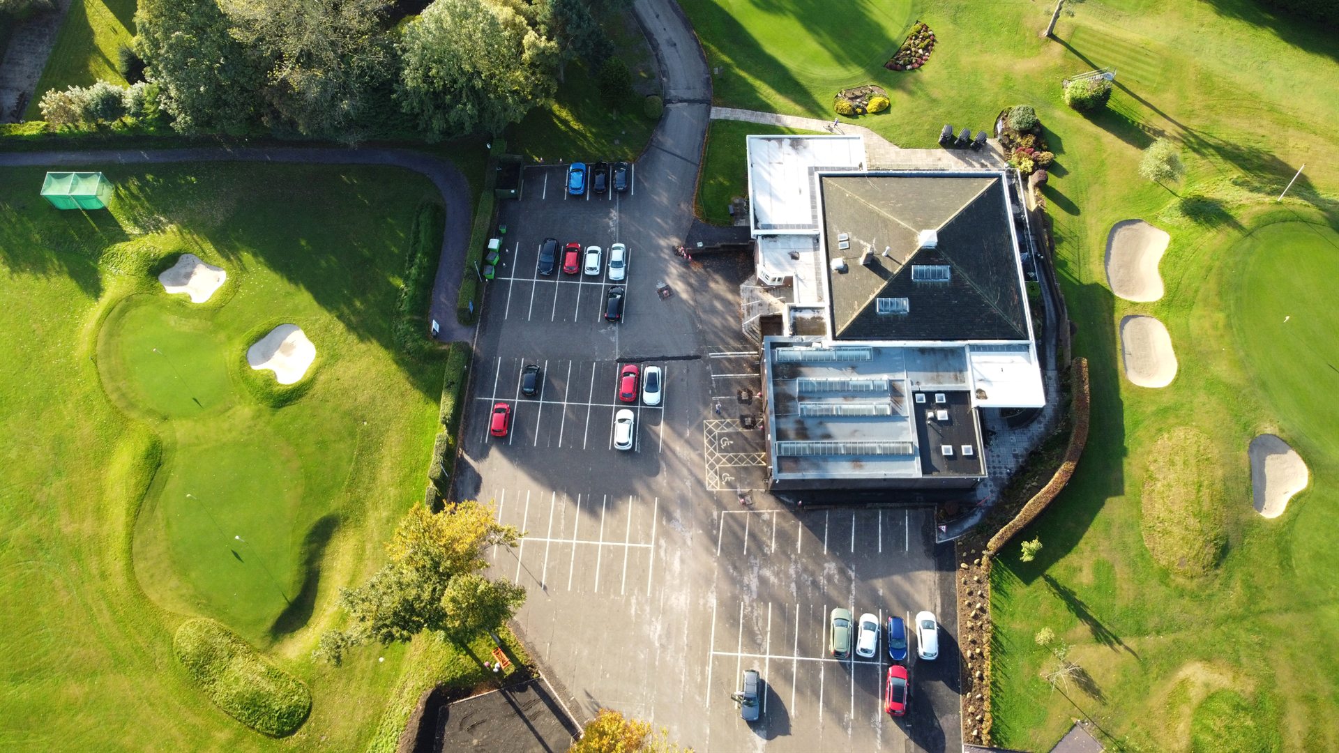 Aerial view showing the scale of the Sand Moor Golf Club car park in Leeds
