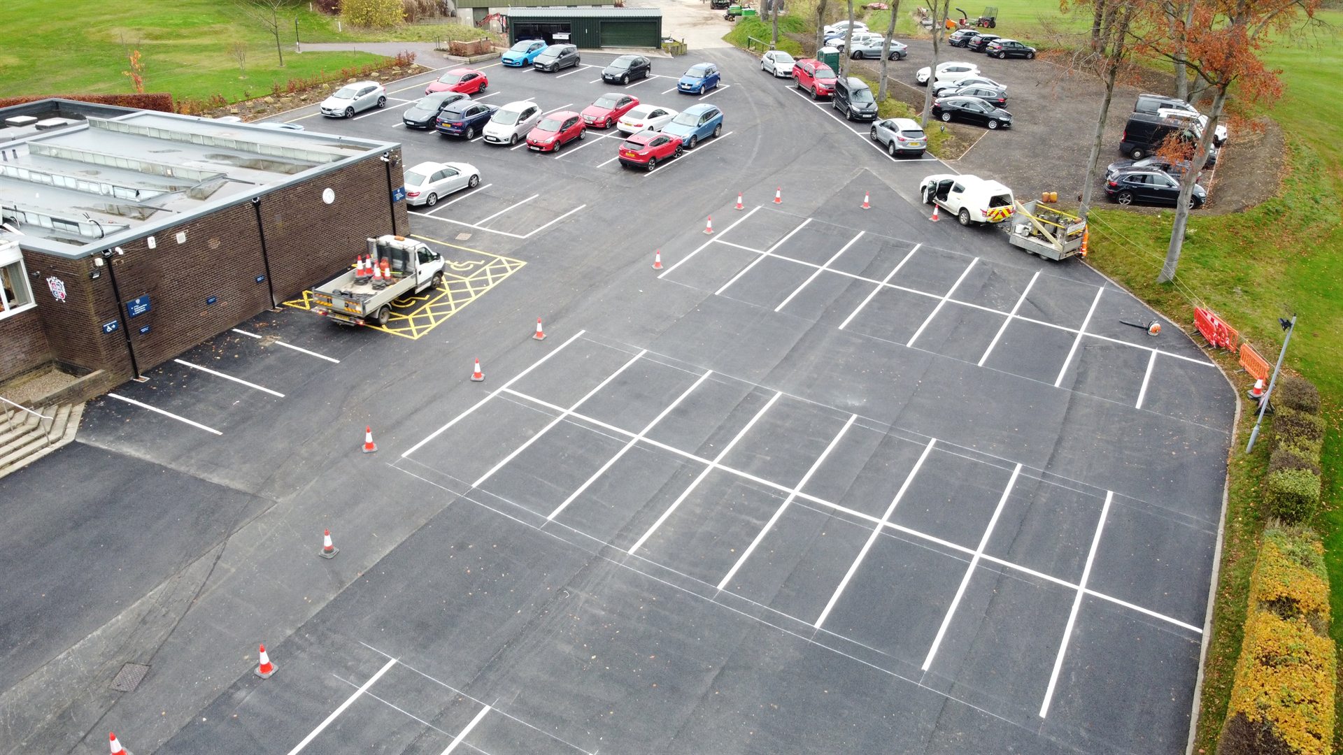 Oblique drone view of completed Sand Moor Golf Club car park in use