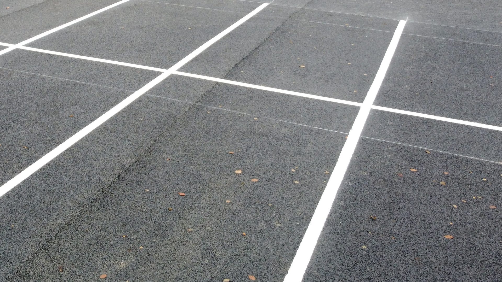 Line-marked finished asphalt bays at Sand Moor Golf Club